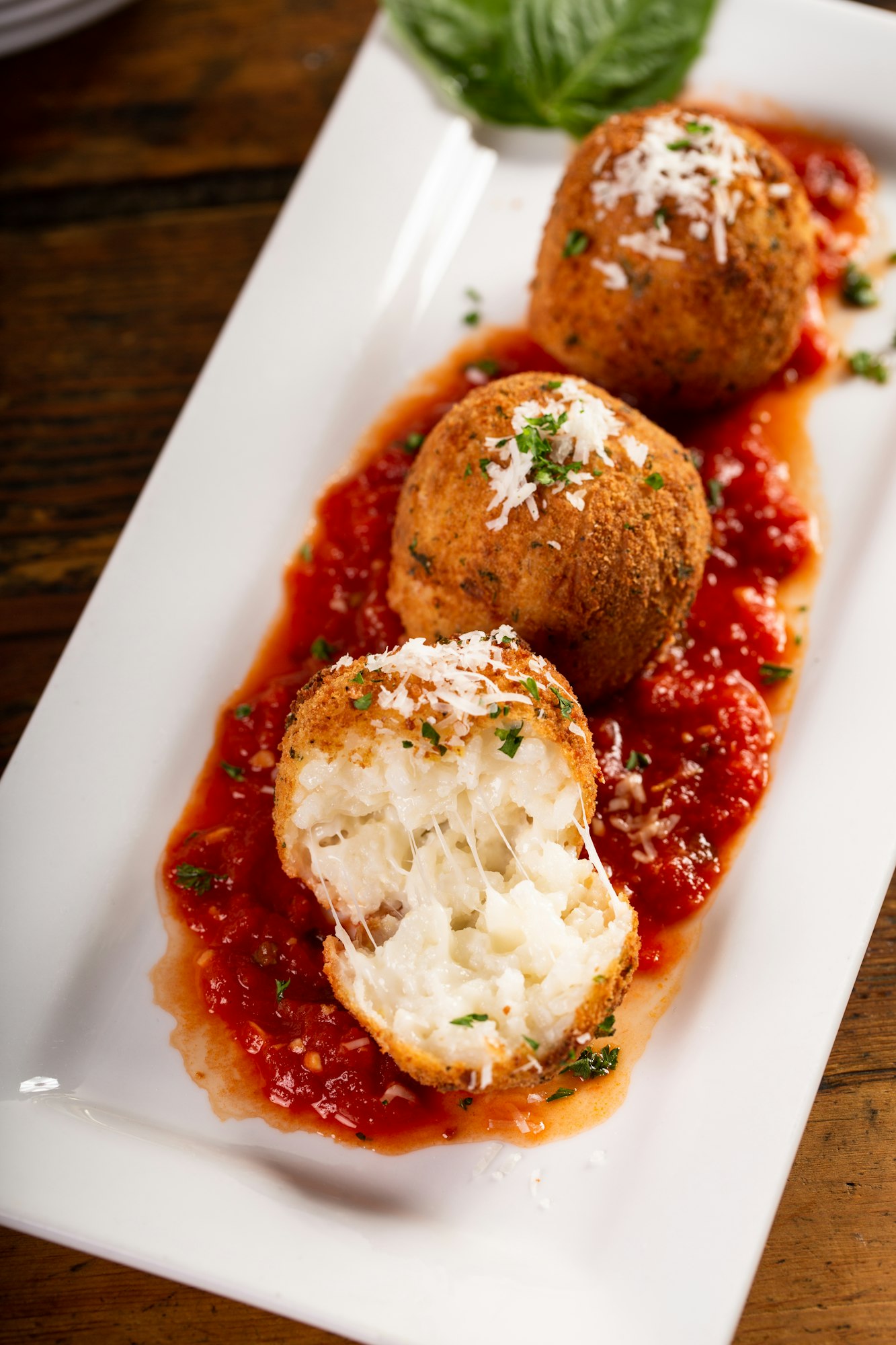 Arancini, stuffed Italian rice balls coated with bread crumbs